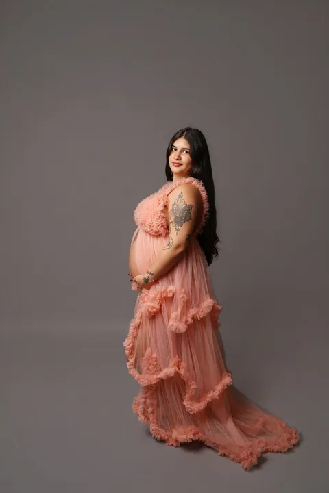 Coral tiered ruffle gown