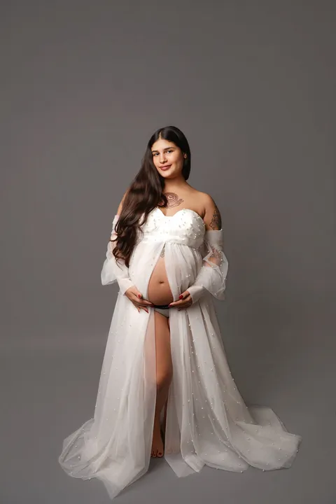 White tulle gown with puff sleeves