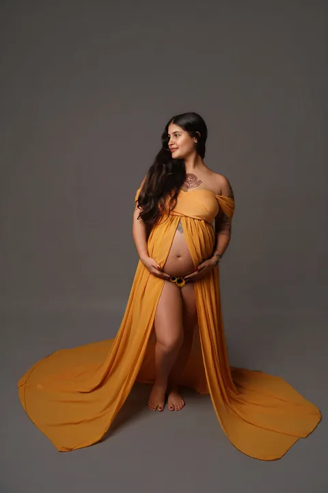 Mustard draped gown with train